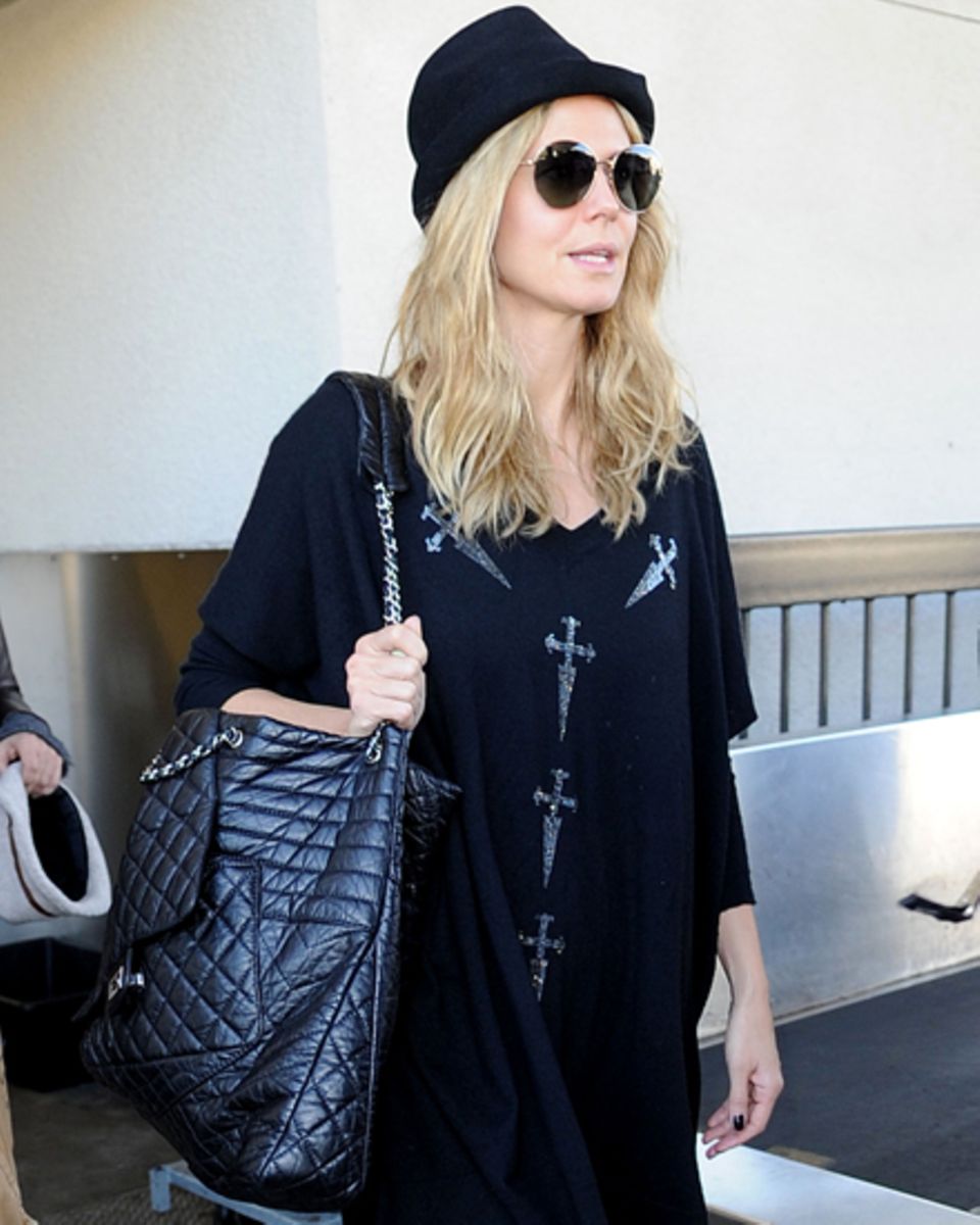 Sonnenbrille auf - und durch! Äußerlich lässt sich Heidi (hier am Flughafen in Los Angeles) nicht anmerken, wie es in ihr aussie Sonnenbrille auf - und durch! Äußerlich lässt sich Heidi (hier am Flughafen in Los Angeles) nicht anmerken, wie es in ihr aussie