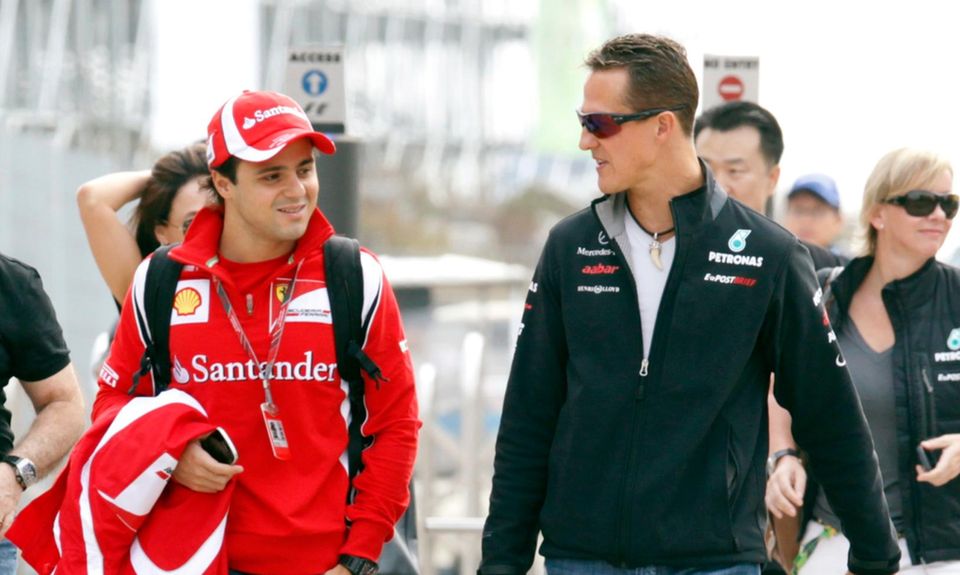 Felipe Massa und Michael Schumacher waren 2006 Teamkollegen bei Ferrari und sind auch darüber hinaus in engem Kontakt geblieben. Das Foto zeigt die Rennfahrer 2011 in Südkorea.