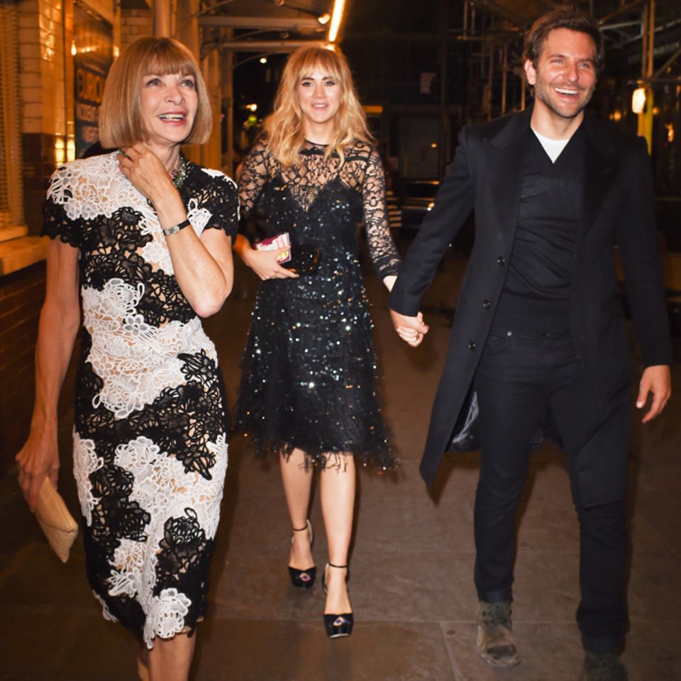 Anna Wintour, Suki Waterhouse und Bradley Cooper während der Fashion Week in London.