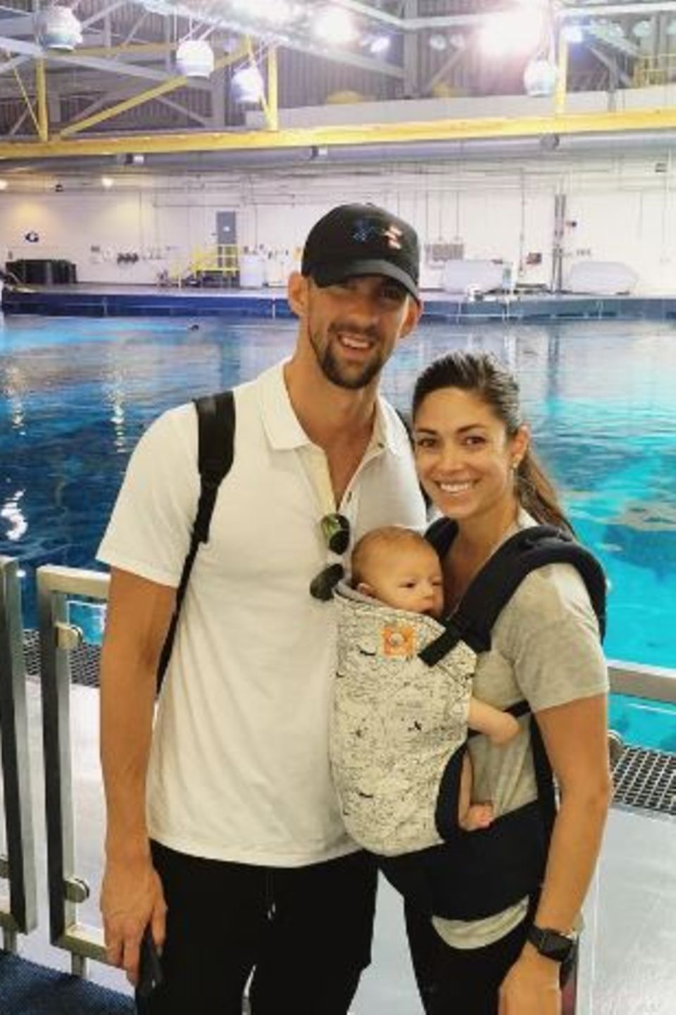 Michael Phelps mit Nicole Johnson und Baby Boomer
