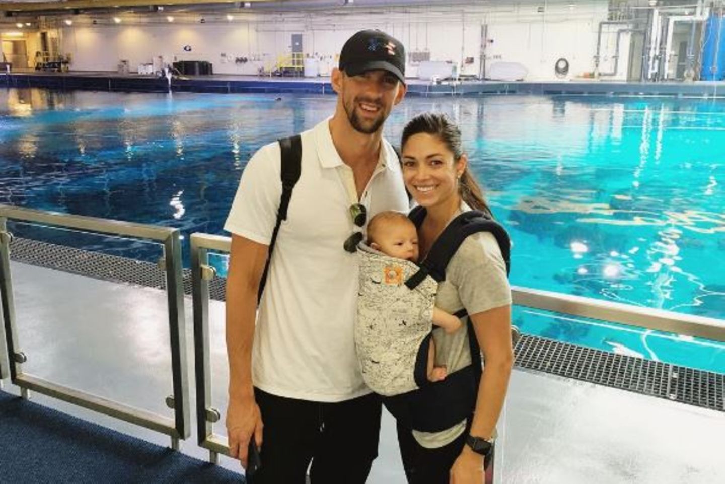 Michael Phelps mit Nicole Johnson und Baby Boomer