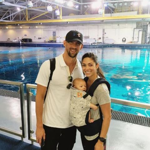 Michael Phelps mit Nicole Johnson und Baby Boomer