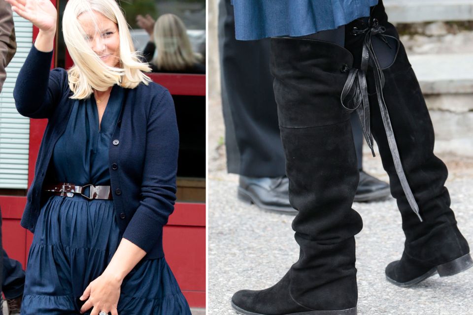 Stiefel in Overknees-Länge sieht man sonst eher selten an royalen Füßen: Kronprinzessin Mette-Marit trug sie in sportlicher Variante zum Schulbesuch zu ihrem dunkelblauen Kleid mit Strickjacke.