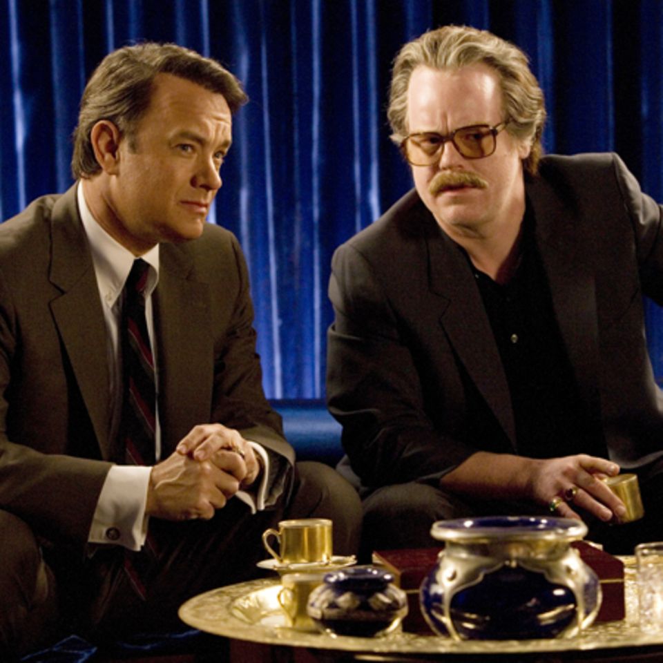 Tom Hanks alias Charlie Wilson und und Philip Seymour Hoffman alias Gust Avarakotos