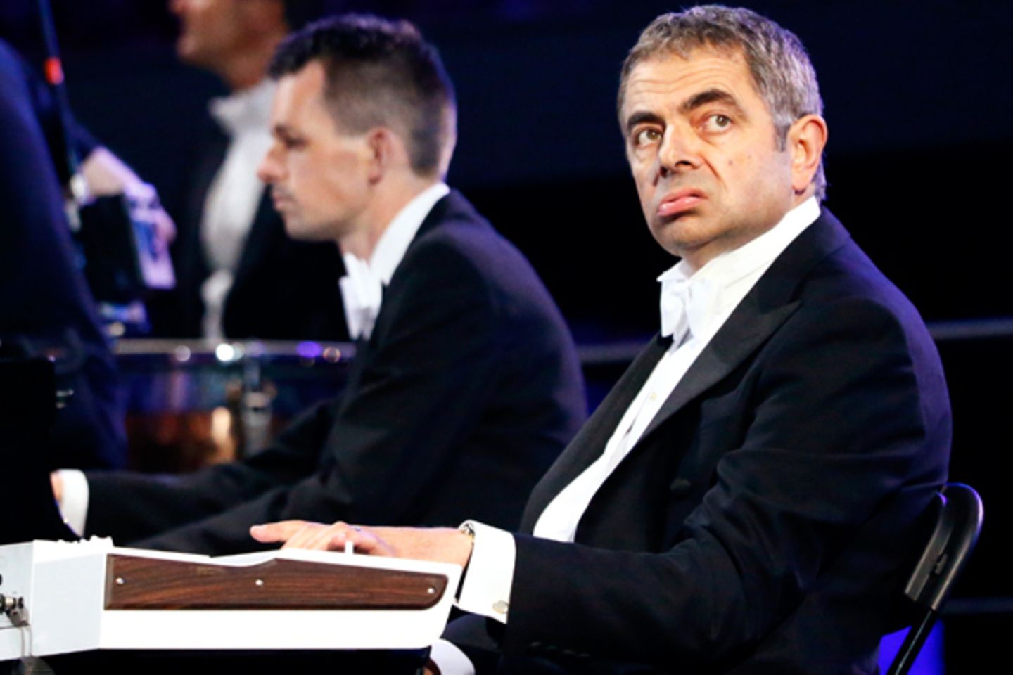 "Mr. Bean"-Darsteller Rowan Atkinson tritt während der Eröffnungszeremonie auf.