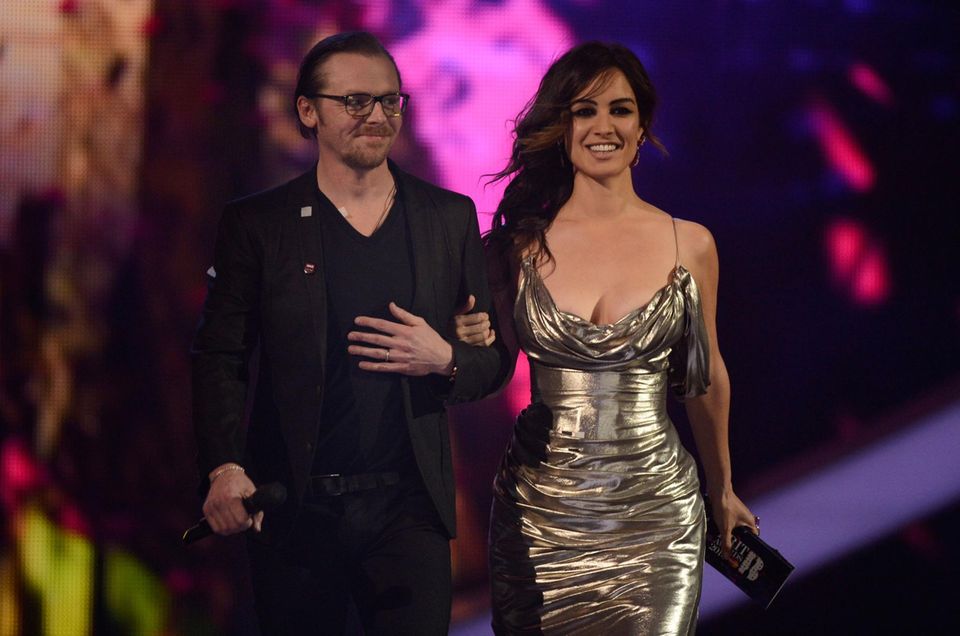 Die Schauspieler Simon Pegg und Bérénice Marlohe