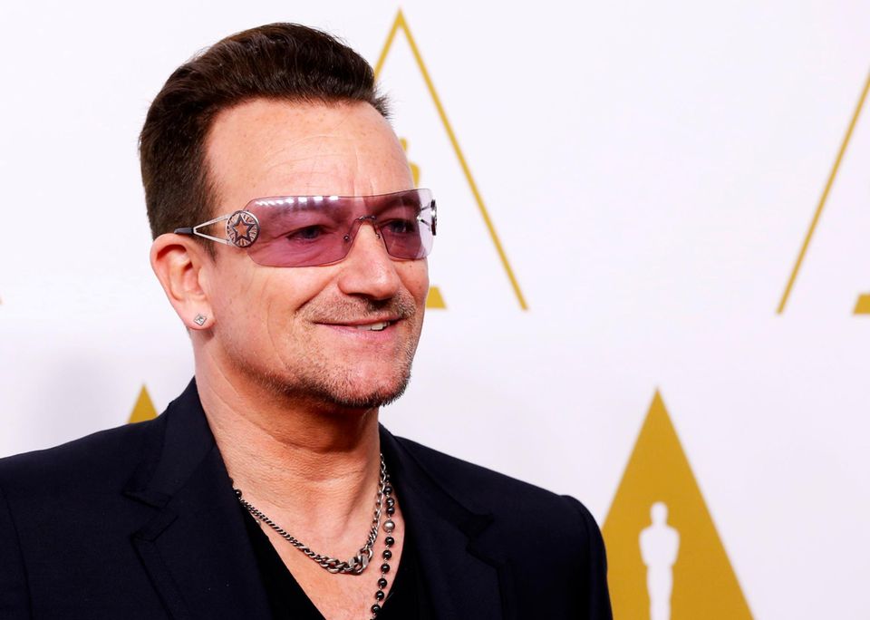 Bono kommt zum Luncheon, auch U2 sind für einen Oscar nominiert.
