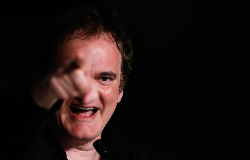 Quentin Tarantino zeigt sich entschlossen bei der Pressekonferenz zu "Pulp Fiction". Quentin Tarantino zeigt sich entschlossen bei der Pressekonferenz zu "Pulp Fiction".