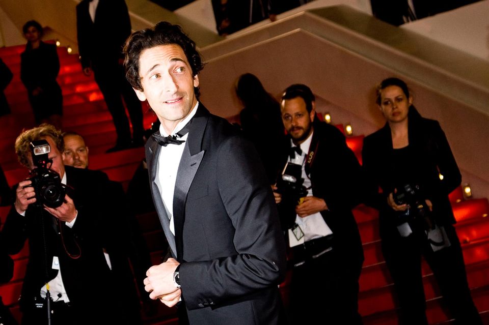 Auch Adrien Brody ist bei der Premiere von "Coming Home" dabei.