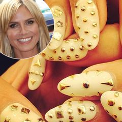 Akzente setzt Heidi mit goldenen Steinchen auf ihren weißen Krallen, die sie zur "America's got talent" Show ausführt.