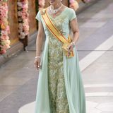 Die japanische Prinzessin Takamado strahlt in einer lindgrünen, brokatbesetzen Robe.