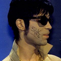 Anfang der Neunzigerjahre firmierte er nicht mehr als Prince. Statt eines Namens firmierte er nur noch unter einem Symbol oder auch als TAFKAP, The Artist Formerly Known As Prince. Nachdem er sich im Streit über die Verträge und Musikrechte von seinem Plattenlabel getrennt hatte, schrieb er sich aus Protest bei Auftritten das Wort "Slave" auf die Wange.