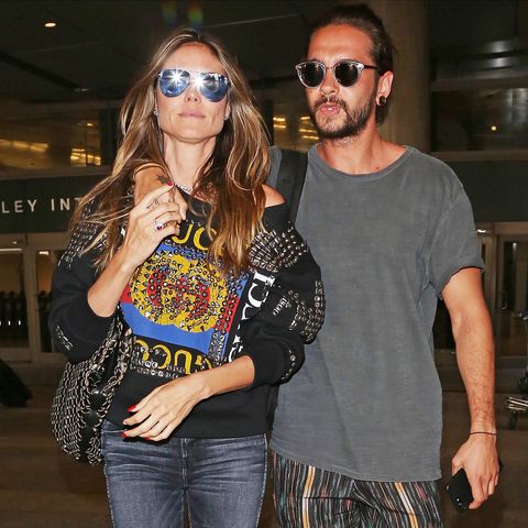 12. April 2018  Heidi Klum und Tom Kaulitz wirken sehr vertraut, als sie am Flughafen "LAX" in Los Angeles gesichtet werden.