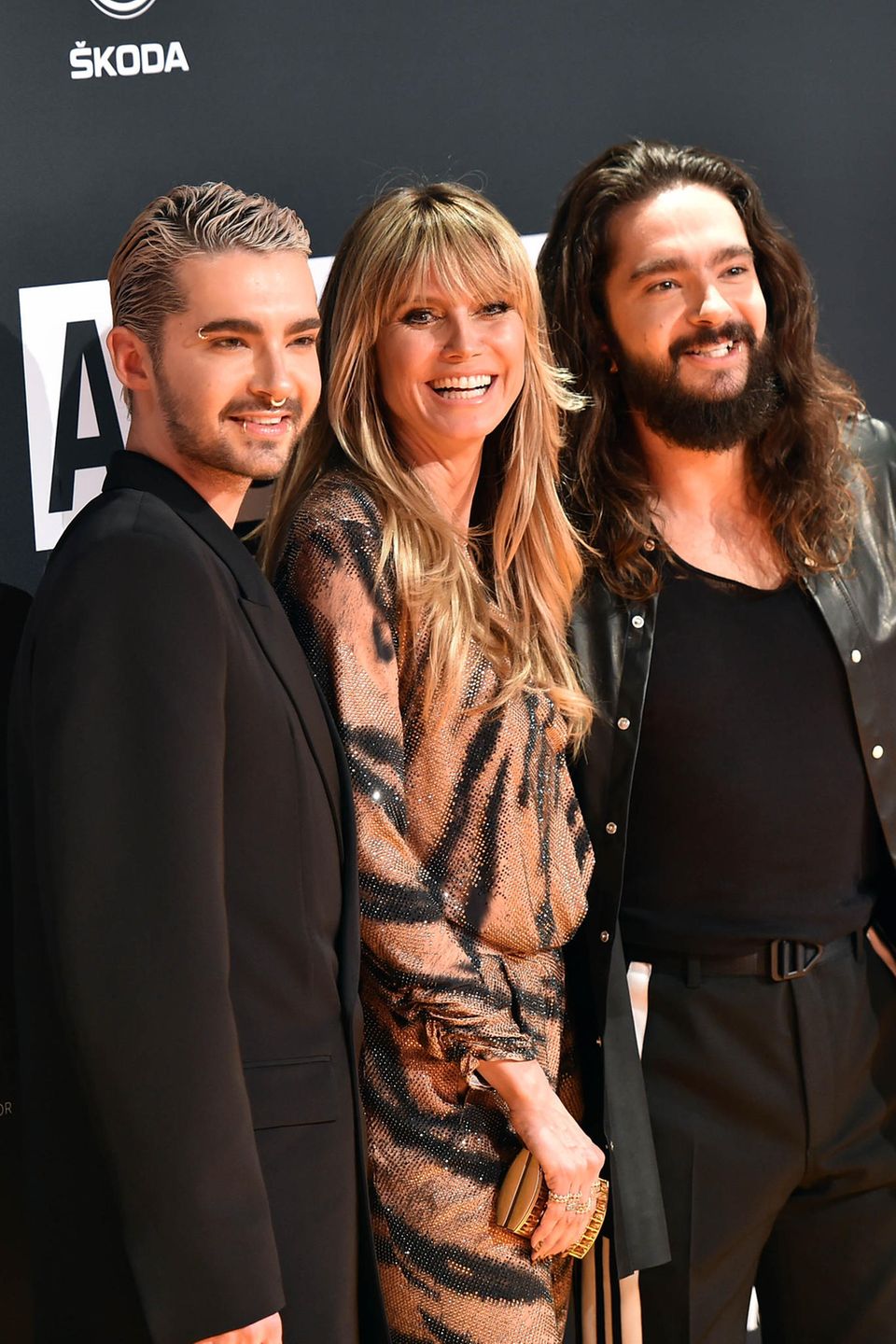 Heidi Klum zwischen Bill Kaulitz und Tom Kaulitz bei den "About You" Awards.