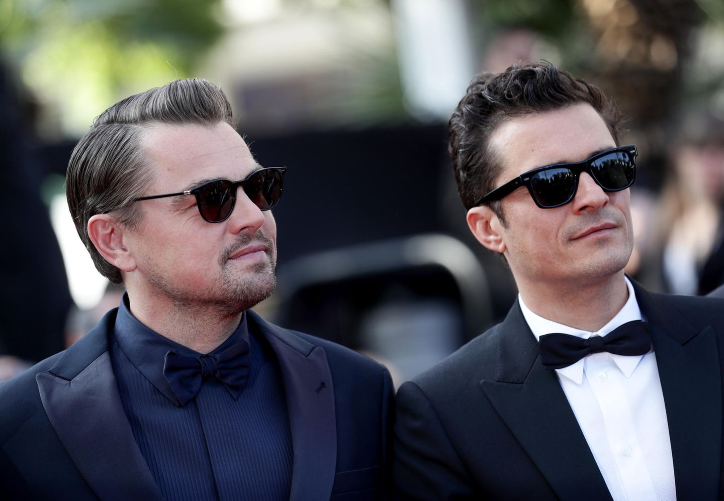 Haben sich Leonardo DiCaprio und Orlando Bloom etwa abgesprochen ? Bei der Filmvorführung von "The Traitor" erscheinen die beiden Hollywoodstars lässig mit Sonnenbrille.