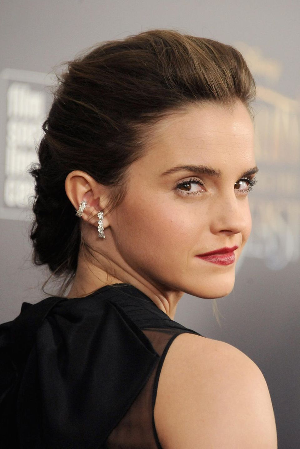 Was festliche Frisuren angeht, hat Emma Watson buchstäblich den Dreh raus.