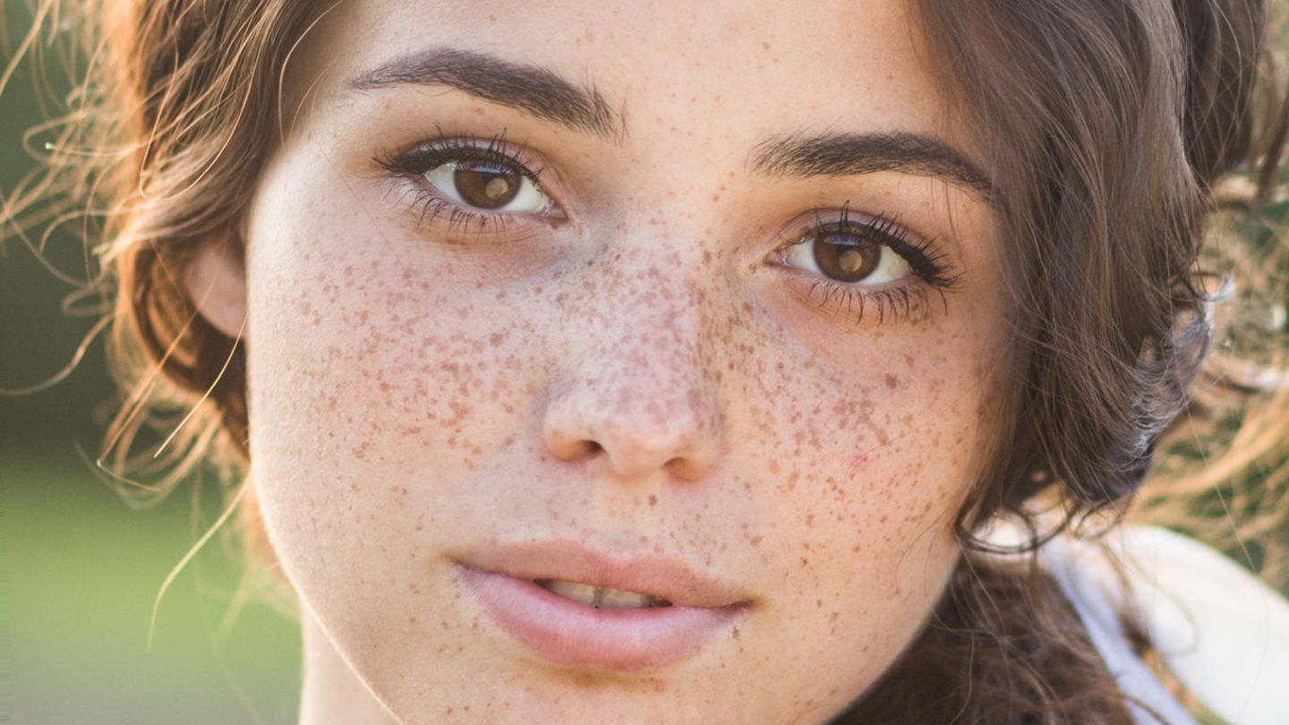 Latina with freckles