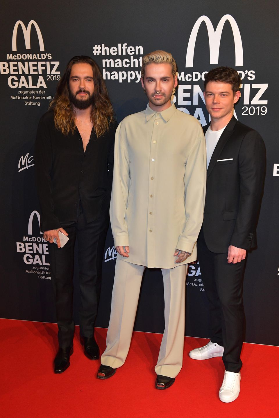 Tom Kaulitz, Bill Kaulitz und Georg Listing am 9. November in München.