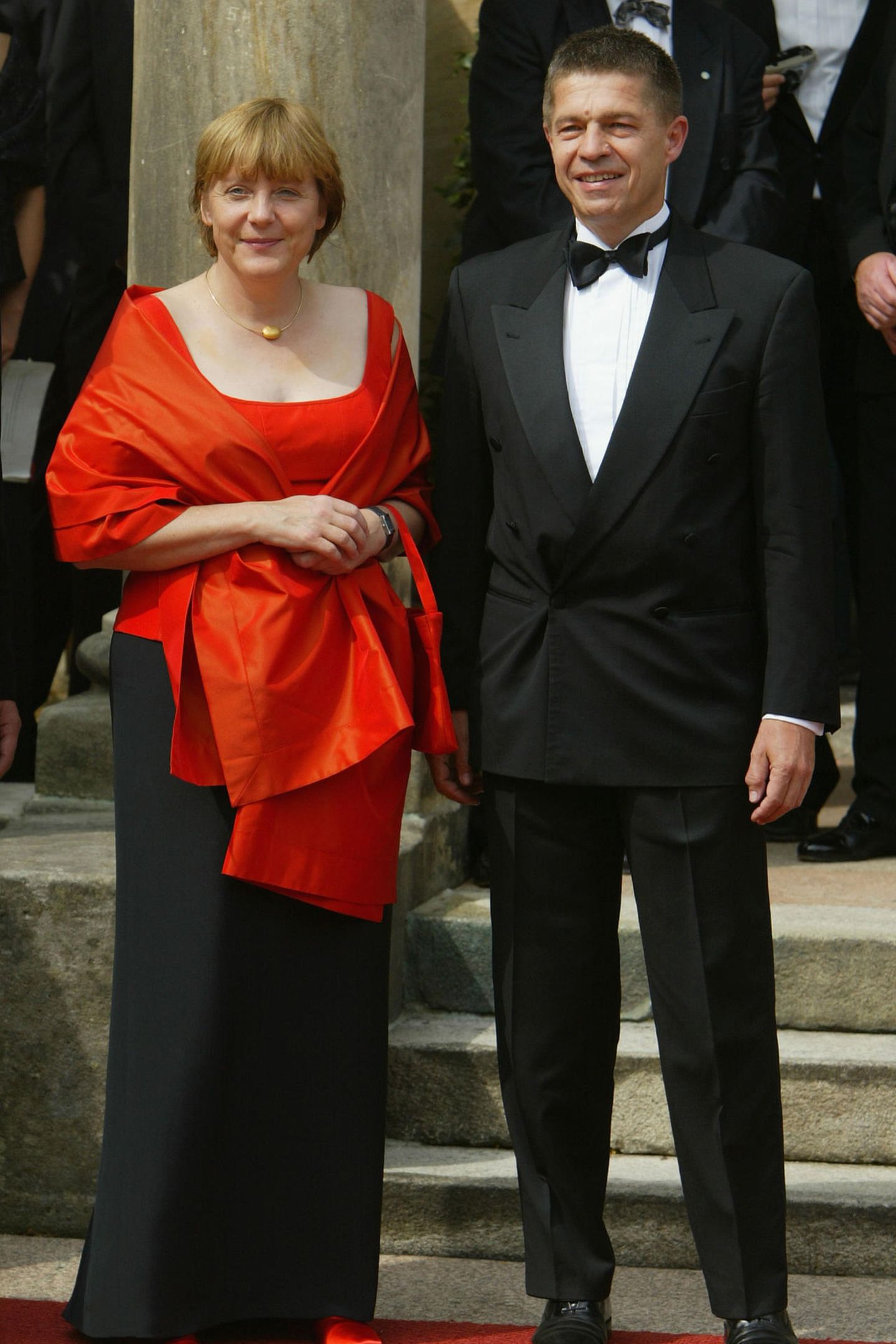 Angela Merkel und Joachim Sauer posieren für die Fotografen.