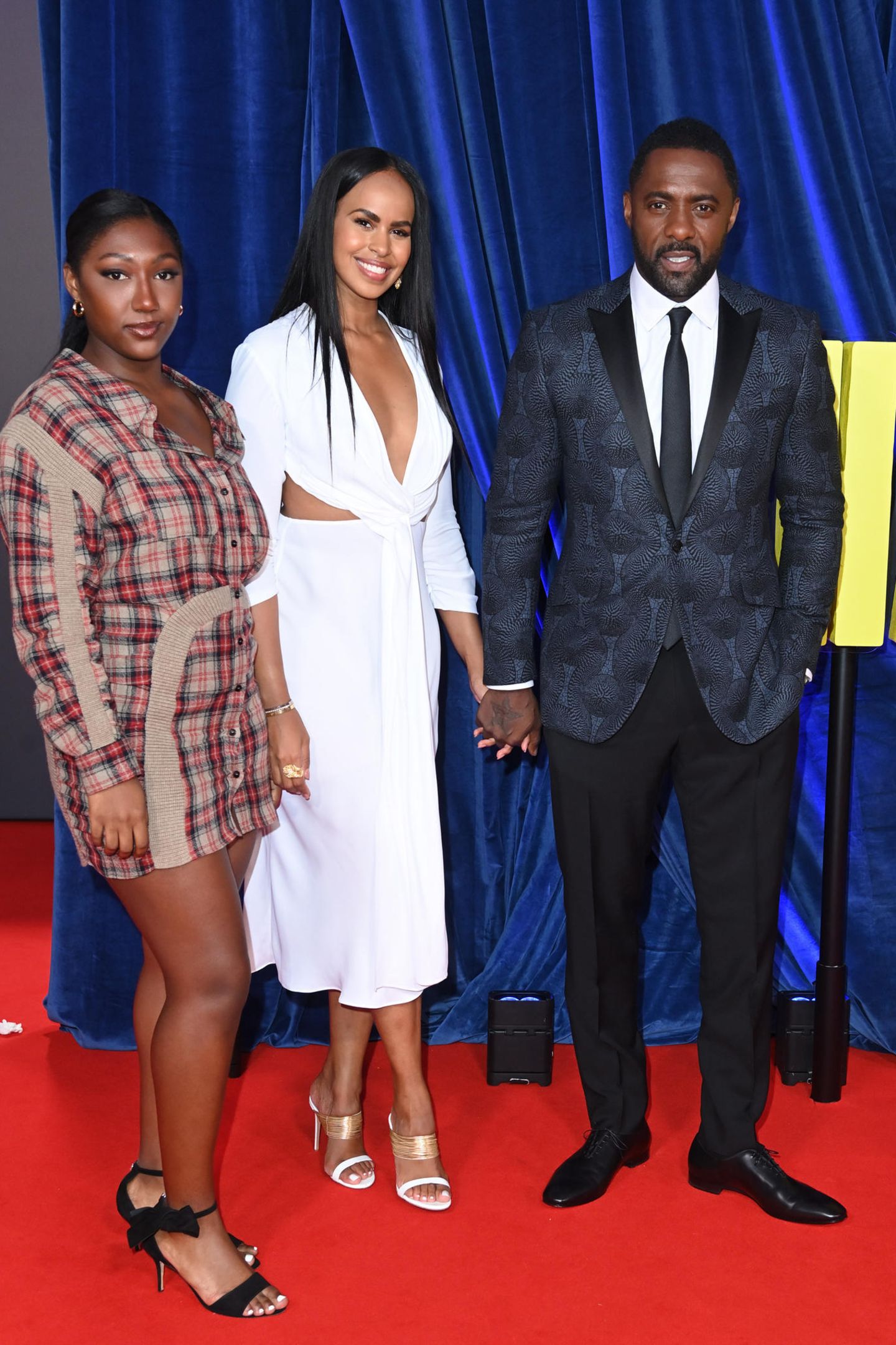 Isan Elber, Sabrina Dhowre Elba und Idris Elba posieren auf dem Red Carpet für die Fotografen.