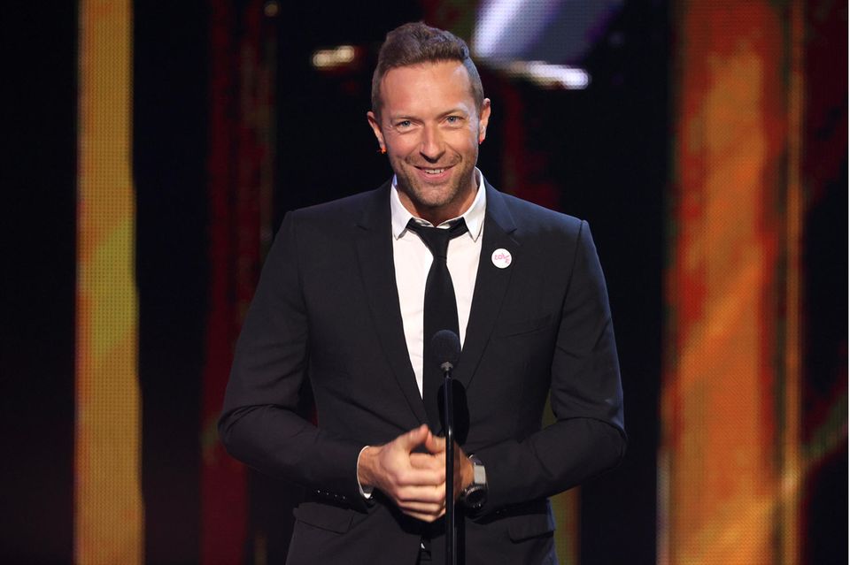 Dakota Johnson: Chris Martin Chris Martin