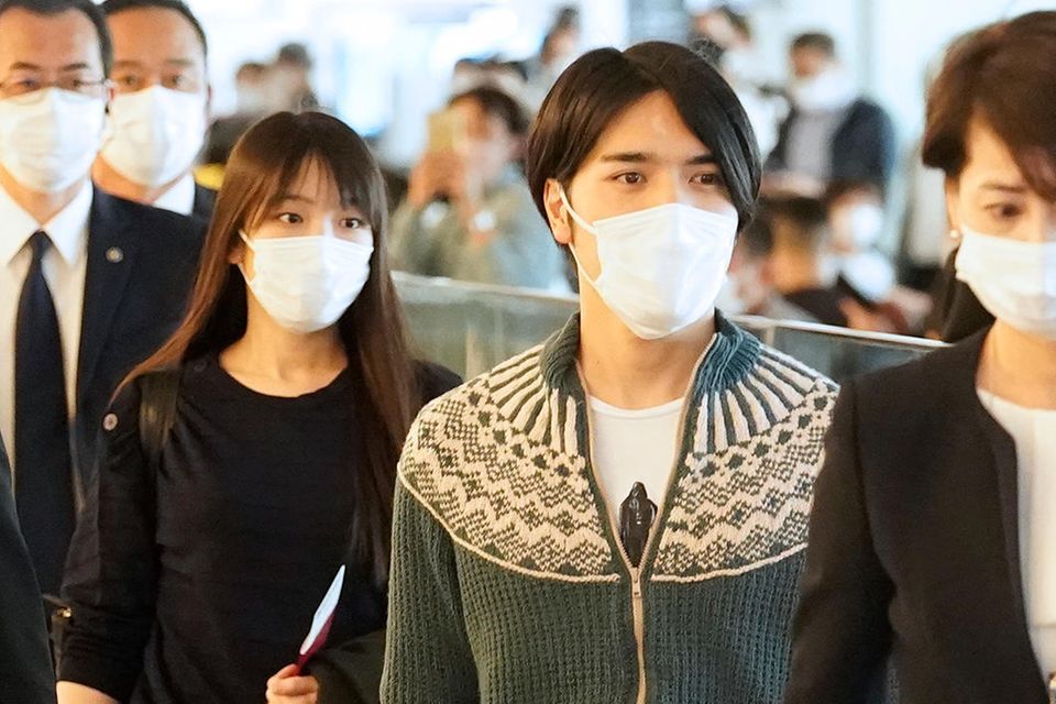 Princess Mako and Kei Komuro on their departure to the USA at Haneda International Airport in Tokyo on November 14, 2021.