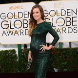 Schlicht elegant und doch glitzernd schön im dunkelgrünen Gucci-Kleid präsentiert sich die schwangere Olivia Wilde bei den Golden Globes 2014.