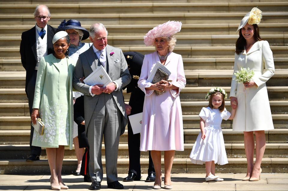 19. Mai 2018 Zur opulenten Hochzeit von Prinz Harry und Meghan Markle in Windsor strahlen Catherine im cremefarbenen Manteldress von Alexander McQueen und Charlotte im weißem Baumwollkleid mit den anderen Familienmitgliedern um die Wette.