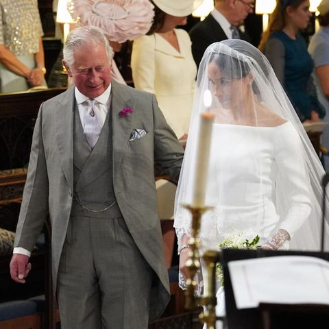 Prinz Harry, Prinz Charles und Herzogin Meghan bei ihrer Hochzeit 2018.