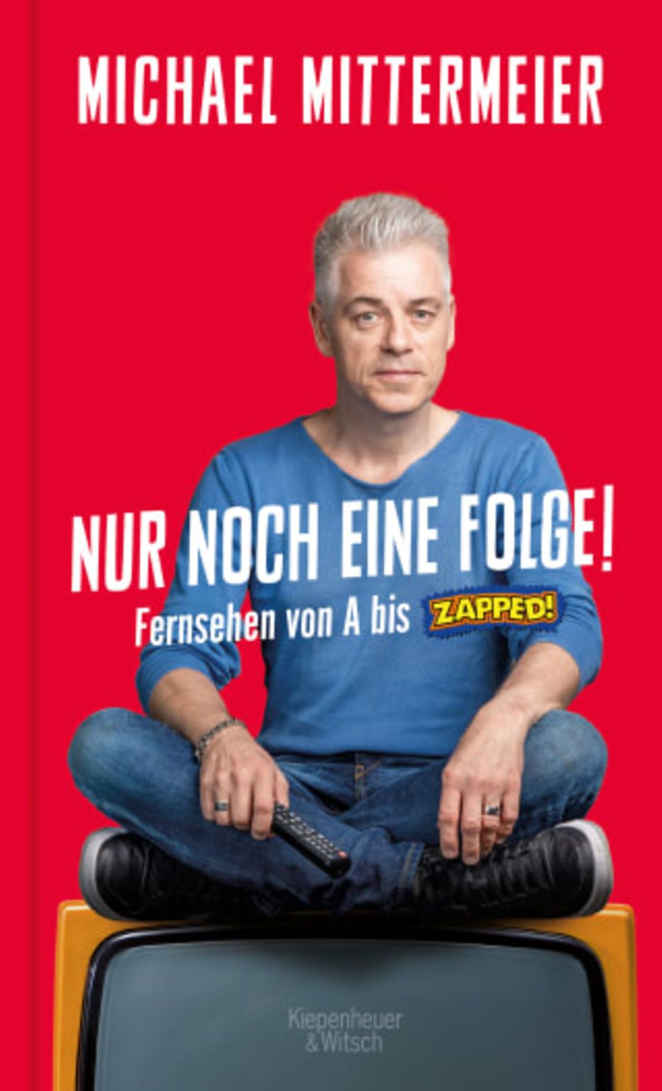 Michael Mittermeiers neues Buch "Nur noch eine Folge! Fernsehen von A bis Zapped" ist am 10. März 2022 bei Kiepenheuer & Witsch erschienen.