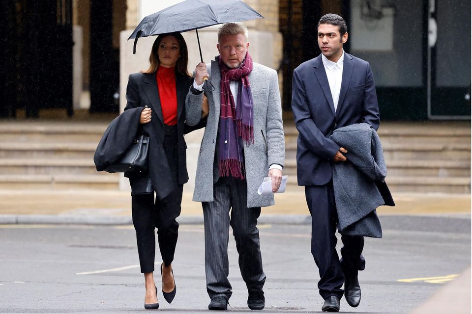 Boris Becker is joined by his girlfriend Lillian and son Noah at Southwark Crown Court, London on April 6, 2022.