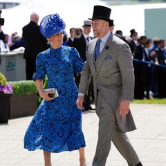 Style der Windsor-Ladys: Zara Tindall und Mike Tindall gehen nebeneinander her.