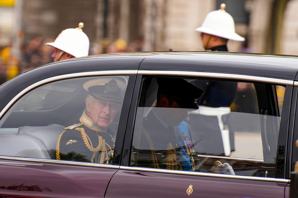 King Charles, Prince William and Prince Harry drive into Westminster Hall