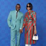 Idris Elba und seine Frau Sabrina Dhowre haben beste Laune mit nach Mailand gebracht und einen farbenfrohen Partner-Style zur Fashion-Show von Gucci.