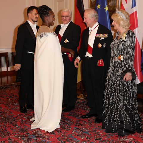 Motsi Mabuse und Ehemann Evgenyj Voznyuk begrüßen beim Staatsbankett in Berlin König Charles und Königin Camilla.