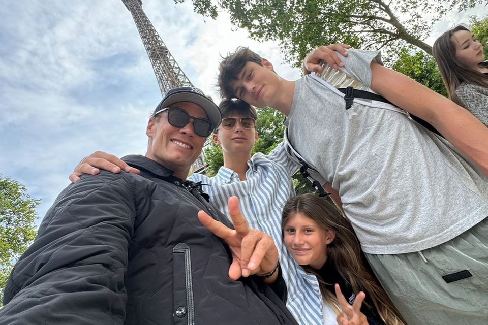 Tom Brady with his children Benjamin, Vivian and Jack.