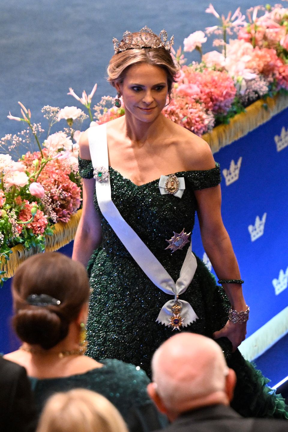 Princess Madeleine impresses with a glittering gown on her Nobel Prize comeback. 