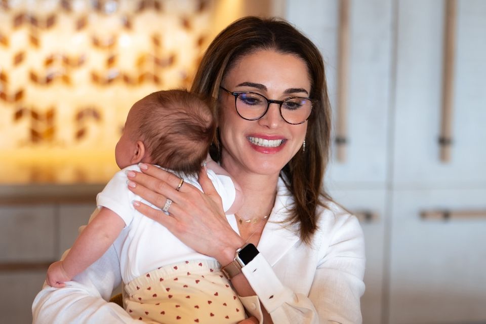 Queen Rania with her granddaughter Iman